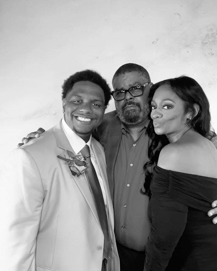 Jordan Thornhill is pictured with his dad Andre Thornhill and his mom Venecca Thornhill.