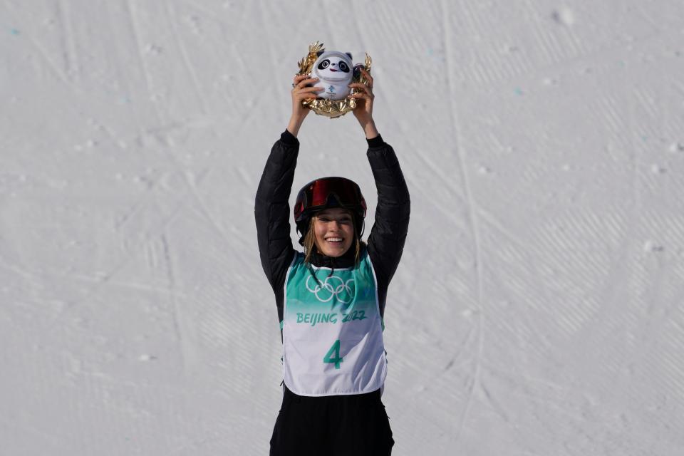 Gold medalist Ailing Eileen Gu (CHN) celebrates on the podium during the freestyle skiing womens big air final during the Beijing 2022 Olympic Winter Games at Big Air Shougang on Feb 8, 2022.