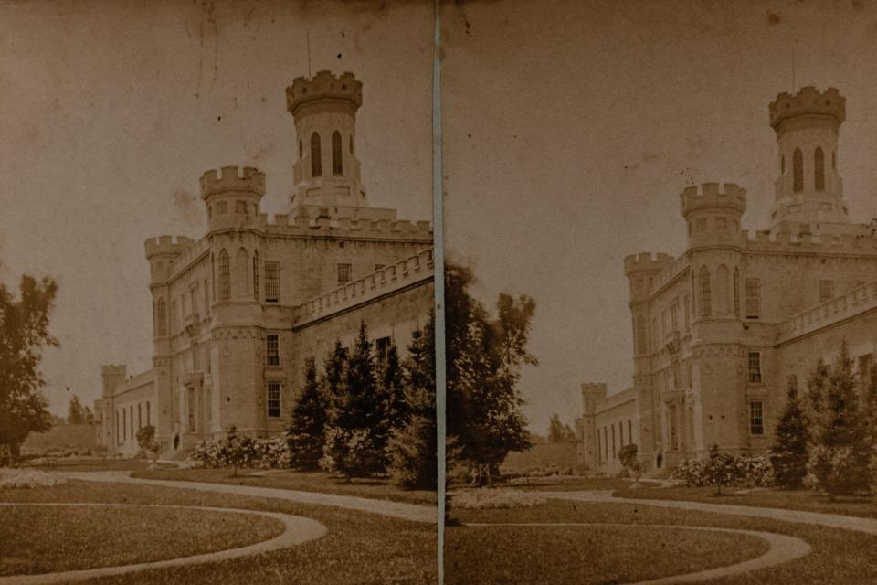 Stereograph cards from the Waupun Historical Society exhibition “If the Walls Could Talk: A History of Wisconsin Corrections at Waupun” are seen at the Waupun Heritage Museum on Aug. 6. The exhibition highlights events regarding the facility dating back to 1851.