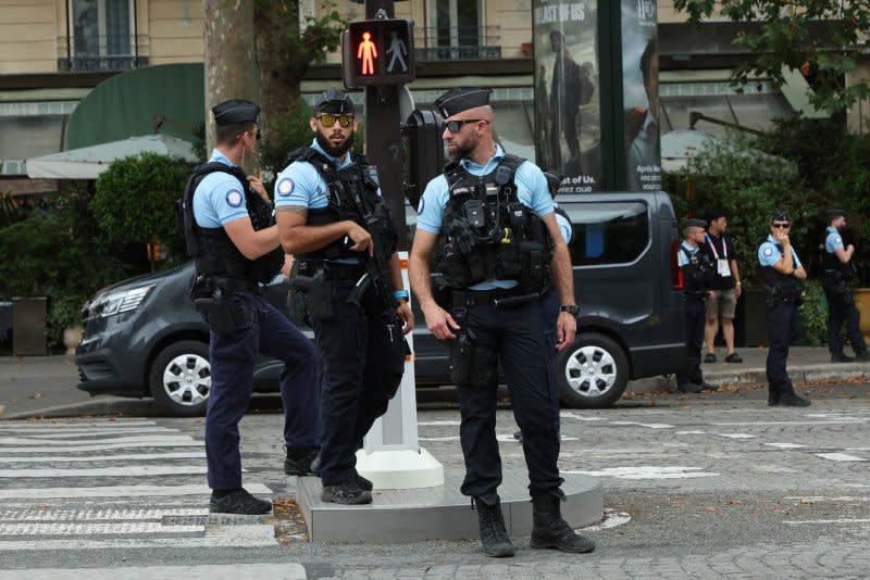 French Police close the roads and step up security ahead of the Olympics opening ceremony tonight in Paris, France on Friday, July 26, 2024. Earlier today an arson attack on the French railway network has caused major delays ahead of the opening ceremony. Photo by Hugo Philpott/UPI