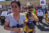 <p>Sharon Chajon, whose husband is a detained immigrant, cries as people participate in a protest against recent U.S. immigration policy of separating children from their families when they enter the United States as undocumented immigrants, in front of a Homeland Security facility in Elizabeth, N.J., June 17, 2018. (Photo: Stephanie Keith/Reuters) </p>