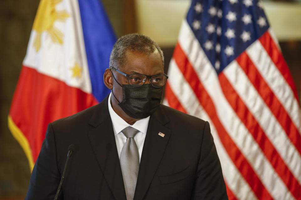 United States Defense Secretary Lloyd Austin holds a press conference with Philippines Defense Secretary Delfin Lorenzana (not in photo) after a bilateral meeting at Camp Aguinaldo military camp in Quezon City, Metro Manila, Philippines Friday, July 30, 2021. Austin is visiting Manila to hold talks with Philippine officials to boost defense ties and possibly discuss the The Visiting Forces Agreement between the US and Philippines. (Rolex dela Pena/Pool Photo via AP)