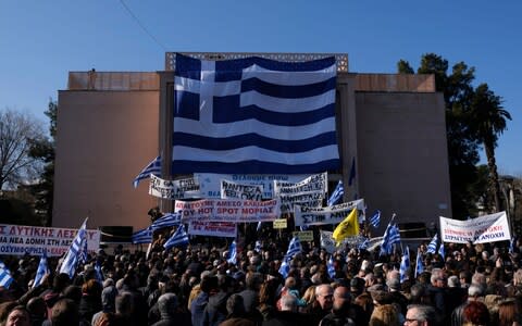 Local residents and business owners have launched a day of protest  - Credit: AP Photo/Aggelos Barai