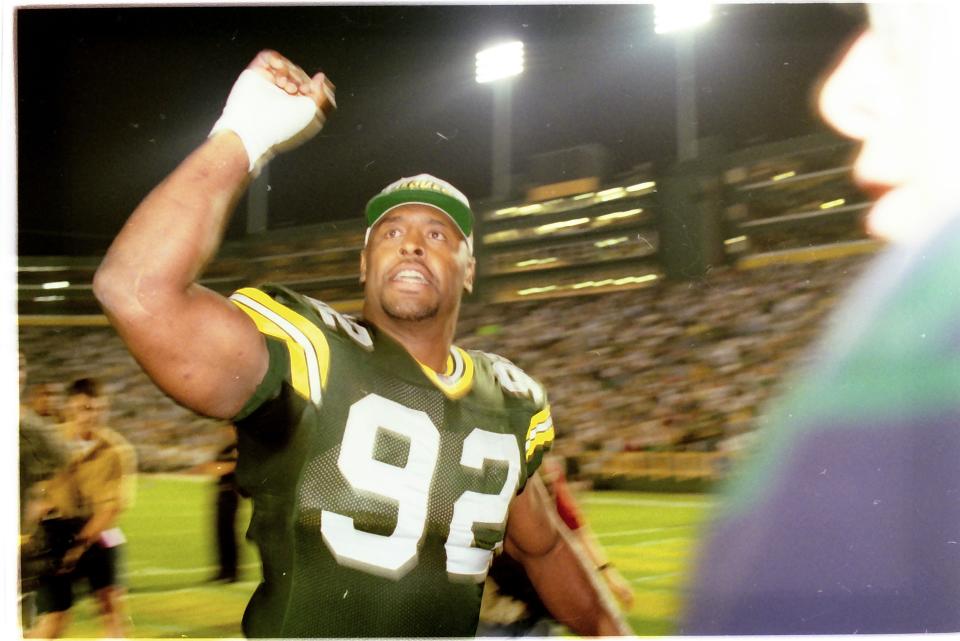 The late Reggie White, seen playing for Green Bay in 1996, had a Hall of Fame career.