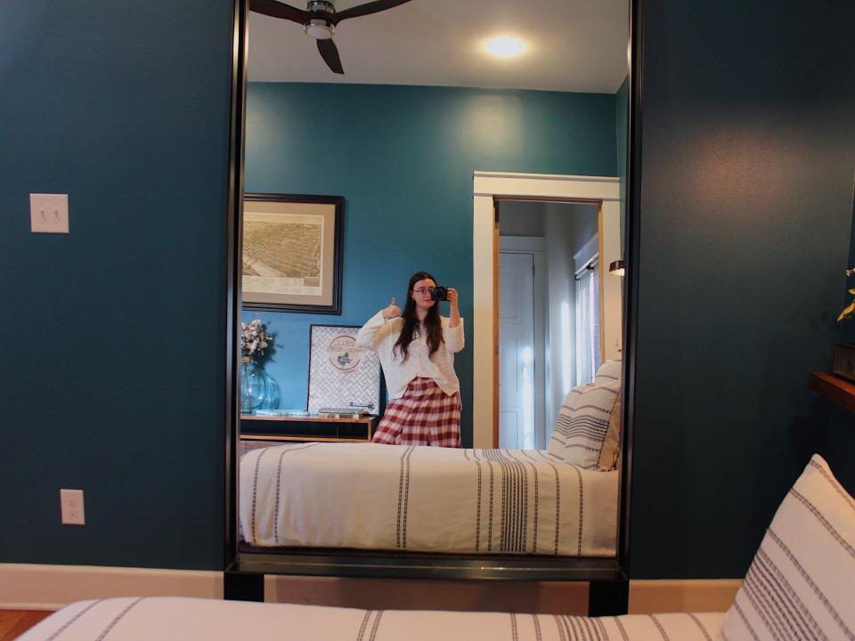 fixer upper shotgun house author taking a mirror selfie