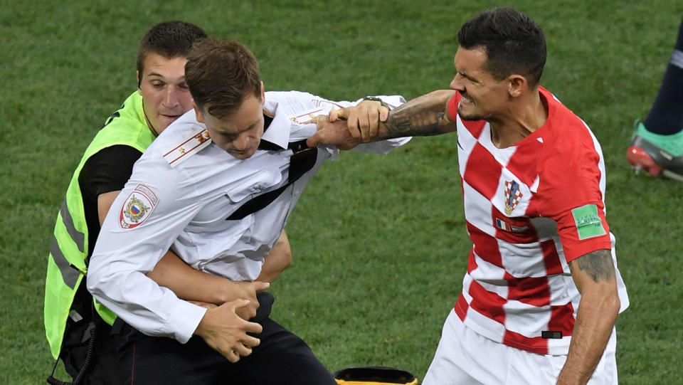 Lovren grabbed one of the intruders. Pic: Getty