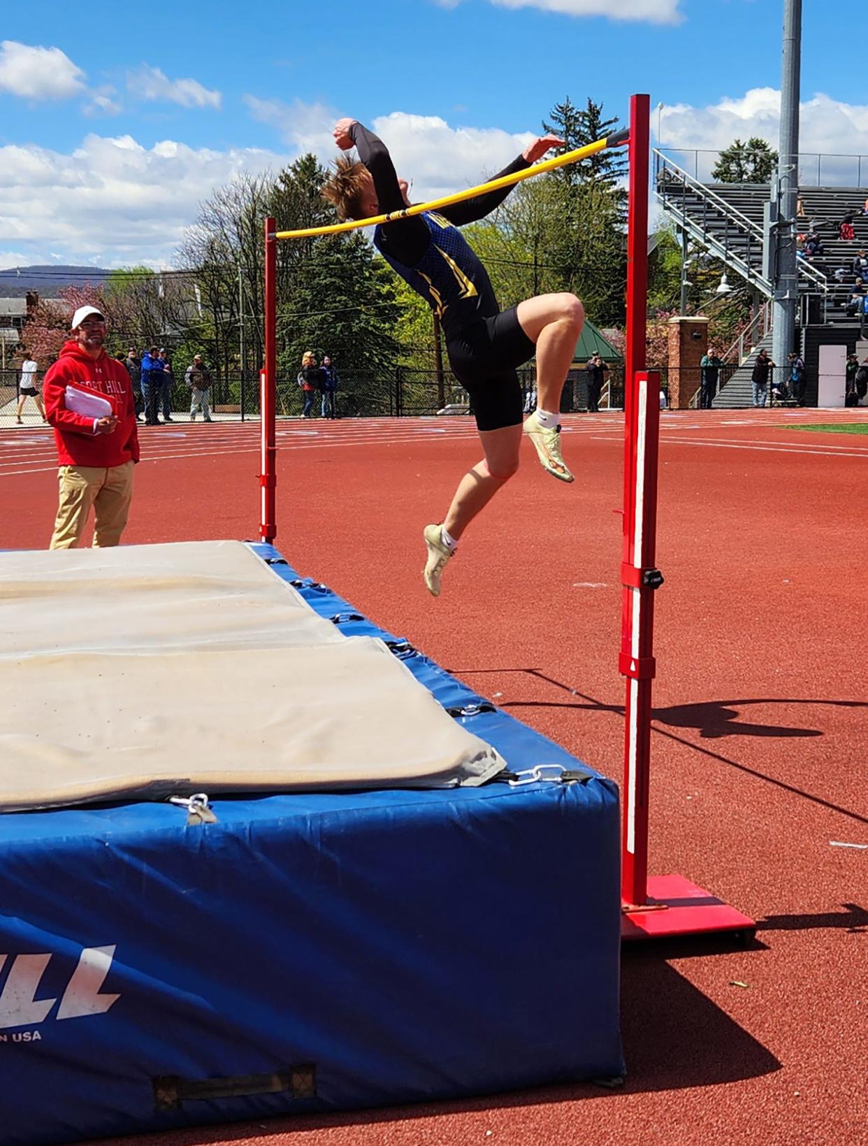 Clear Spring junior Jacob Faith makes his successful leap over 6 feet, 6 inches on his third attempt during the Fort Hill Invitational on April 13.