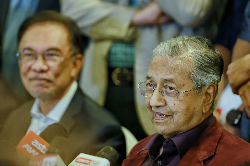 Datuk Seri Anwar Ibrahim and Tun Dr Mahathir Mohamad are seen during a press conference after the Pakatan Harapan President Council Meeting at Yayasan Perdana Foundation February 21, 2020. — Picture by Ahmad Zamzahuri