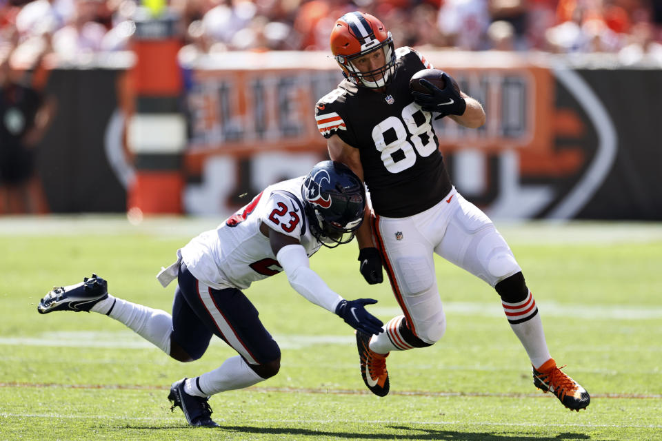 Cleveland Browns tight end Harrison Bryant (88) is tackled by Houston Texans strong safety Eric Murray (23) during the first half of an NFL football game, Sunday, Sept. 19, 2021, in Cleveland. (AP Photo/Ron Schwane)