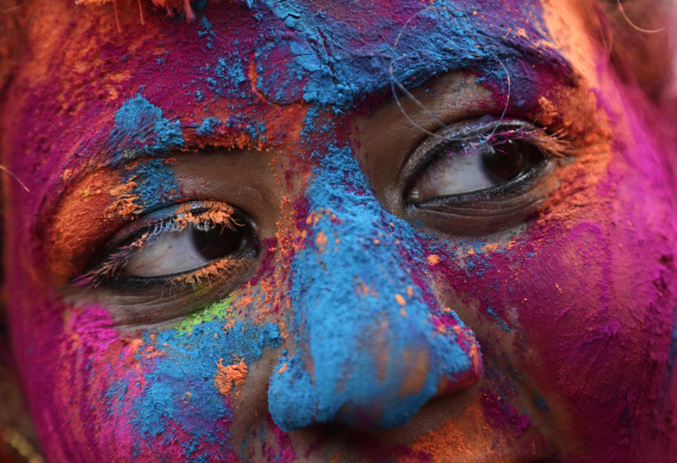 <p>The face of a woman is smeared with colored powder during Holi, the Hindu festival of colors in Kolkata, India, Thursday, March 1, 2018. (Photo: Bikas Das/AP) </p>