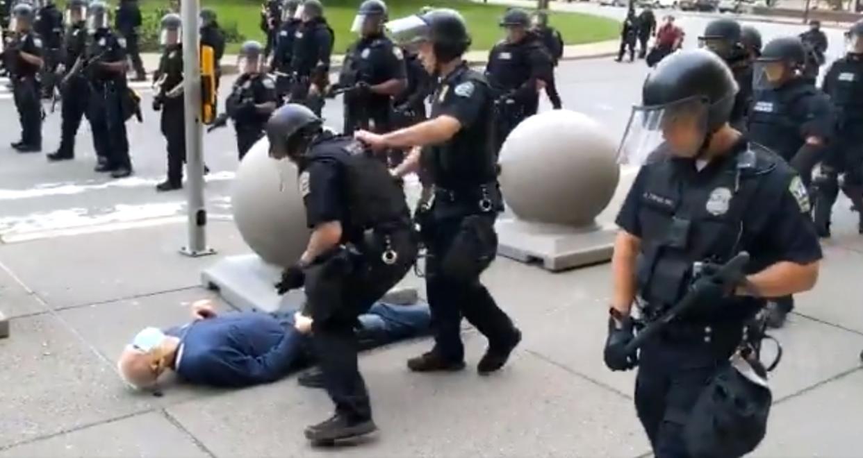 A still from the video of two Buffalo police officers shoving Martin Gugino to the ground: WBFO NPR /AFP via Getty Images