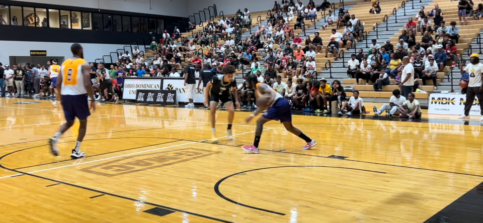 Ohio State commit John "Juni" Mobley Jr. guards Michigan product Zavier Simpson in the Kingdom Summer League championship game at Ohio Dominican University on August 13, 2023.