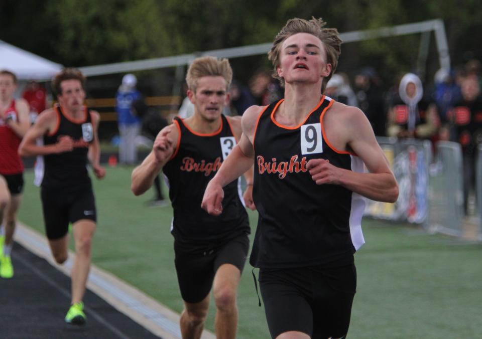 Brighton's Luke Campbell (9) is first and teammate Tyler Langley (3) is second in the 3,200-meter run during the KLAA track and field championships Saturday, May 11, 2024 at Howell High School.