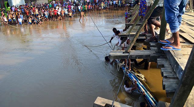 200 people were onboard the boat the time it capsized. Source: AAP