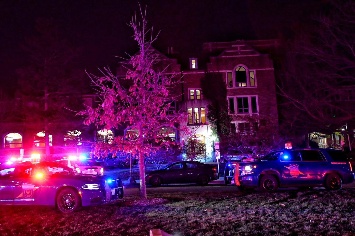 Police stage outside the MSU Union off Abbot Road on Monday, Feb. 13, 2023, on the Michigan State Campus in East Lansing. Two survivors of the mass shooting have taken steps to file lawsuits against the university.