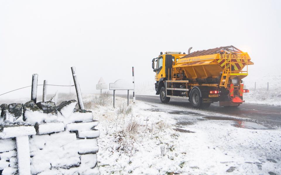 Snow hits County Durham as a gritter passes over the Cumbria/County Durham border on Monday morning