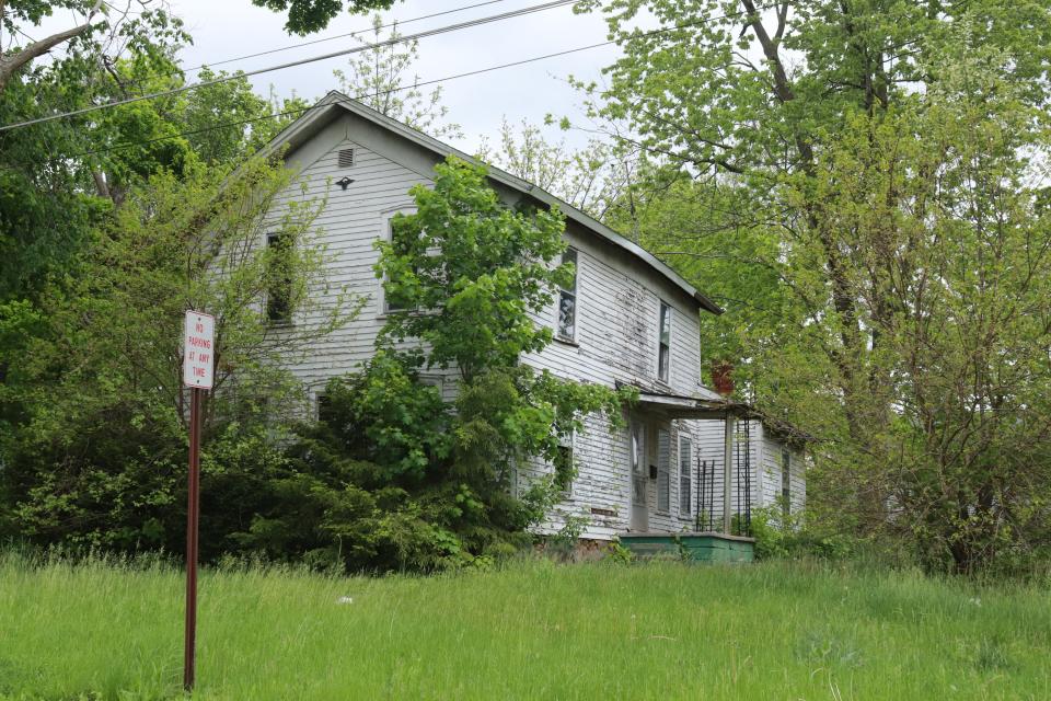 The Hudson City Council on Thursday approved the demolition of 225 Grove St., pictured Saturday. The razing was ordered after the vacant home, deemed a dangerous structure, was not maintained or repaired by the current owner.
