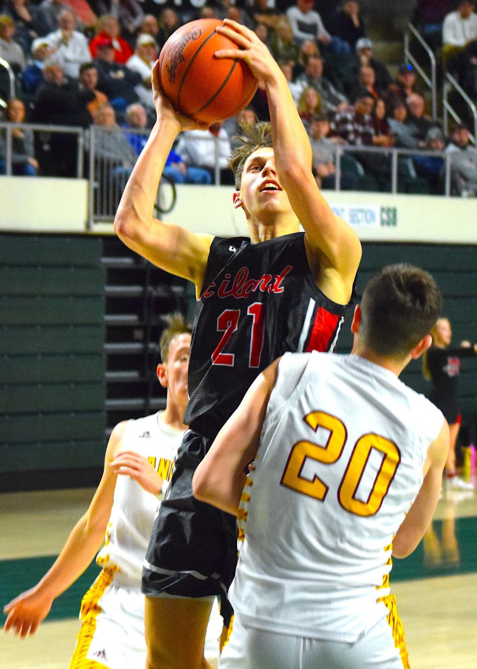 Carson Habeger goes up for two of his 10 points in Hiland's win over Federal Hocking to advance to the Div. IV regional finals.