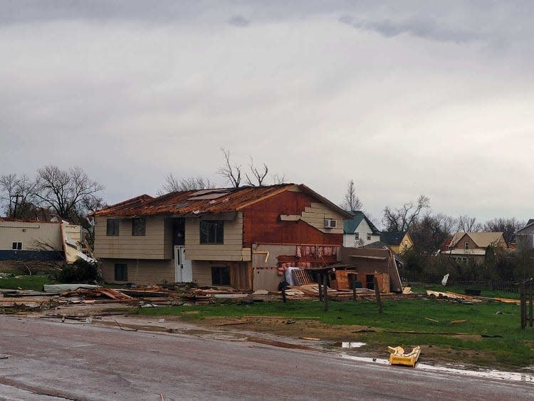 This home in Castlewood was badly damaged when a tornado ripped through the town Thursday evening.