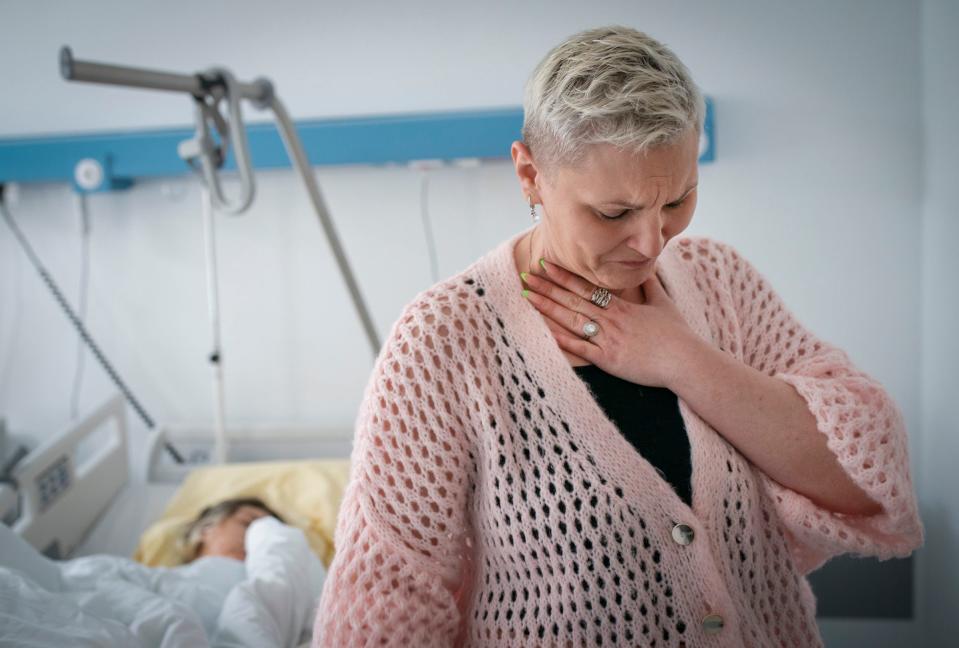Vitalina Petrenko, 38, gets emotional as she talks about her daughter Karolina Petrenko,16, of Cherkasy, Ukraine as she recovers from surgery on Friday, May 19, 2023 that released her fingers that were trapped in her burn scar tissue contractures at the Independent Public Health Care Facility by in Leczna, Poland. Doctors Collaborating to Help Children performed the surgery on Petrenko who was burned Sept. 9, 2019 after being electrocuted while she was taking a selfie at a train station. She, and her siblings have relocated to Warsaw, Poland with their mother because of the war against Ukraine.