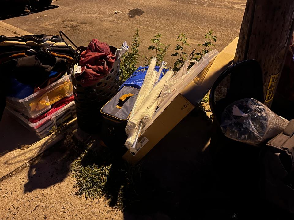 Boxes and bags on a city curb