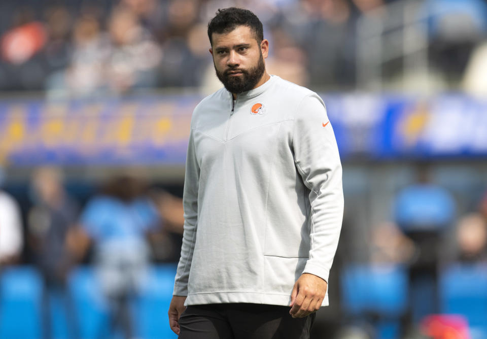 FILE - Cleveland Browns offensive assistant T.C. McCartney watches players before an NFL football game against the Los Angeles Chargers Sunday, Oct. 10, 2021, in Inglewood, Calif. Following the Browns' quick playoff exit, coach Kevin Stefanski shook up his offensive staff on Tuesday, Jan. 16, 2024, by firing running backs coach Stump Mitchell and parting ways with tight ends coach T.C. McCartney, a person familiar with the decisions told The Associated Press.(AP Photo/Kyusung Gong, File)