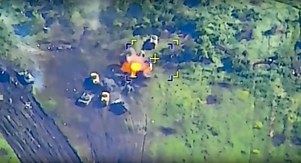 In this photo taken from video released by the Russian Defense Ministry Press Service on Wednesday, June 7, 2023, a Ukrainian military vehicle is hit during combat in Ukraine. Analysts say Moscow has learned from its mistakes so far in Ukraine and has improved its weapons and skills. (Russian Defense Ministry Press Service via AP, File)