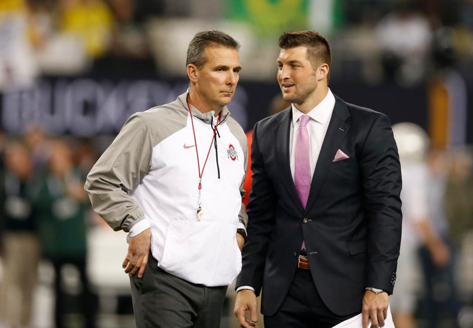 Could Urban Meyer (left) and Tim Tebow (right) be reunited with the Jacksonville Jaguars?