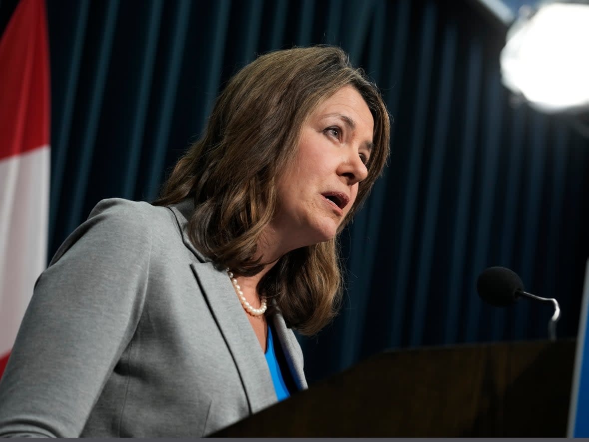 Alberta Premier Danielle Smith answers questions about coming legislation governing transgender medical issues at a news conference in Calgary on Feb. 1.  (Todd Korol/The Canadian Press - image credit)