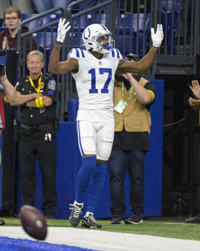 Detroit Lions wide receiver Tom Kennedy (85) makes a catch for a touchdown  over Indianapolis Colts cornerback Tony Brown (38) during first half of an NFL  preseason football game in Indianapolis, Saturday