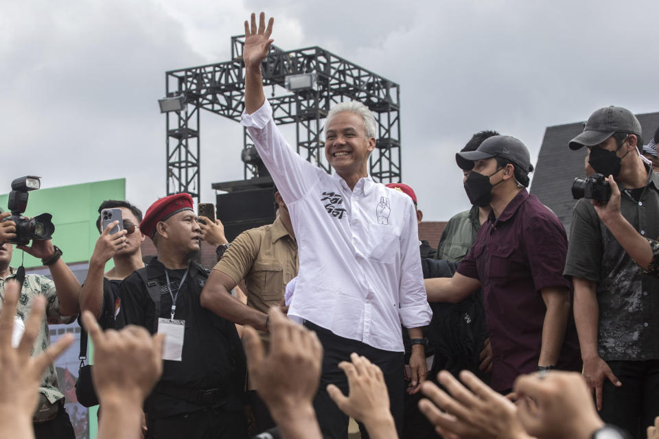 Indonesia's Presidential candidate Ganjar Pranowo, center, waves to his supporters during a campaign rally in Medan, North Sumatra, Indonesia, Monday, Jan. 28, 2024. Indonesians on Wednesday, Feb. 14, 2024 will elect the successor to popular President Joko Widodo, who is serving his second and final term. It is a three-way race for the presidency among current Defense Minister Prabowo Subianto and two former governors, Anies Baswedan and Ganjar Pranowo. (AP Photo/Binsar Bakkara, File)
