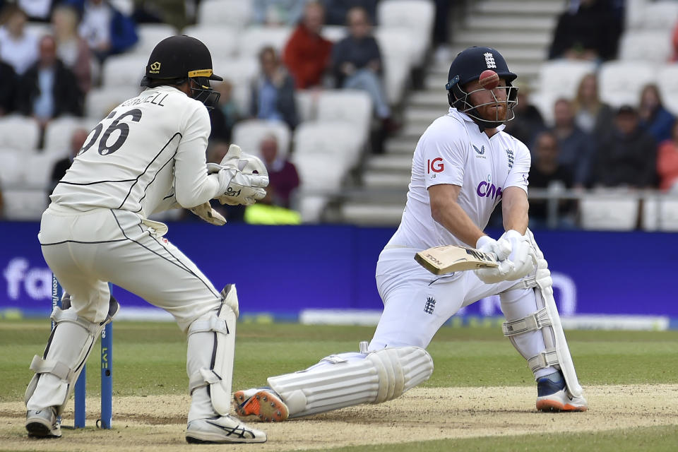 England's Jonny Bairstow, right, plays a shot during the fifth day of the third cricket test match between England and New Zealand at Headingley in Leeds, England, Monday, June 27, 2022. (AP Photo/Rui Vieira)