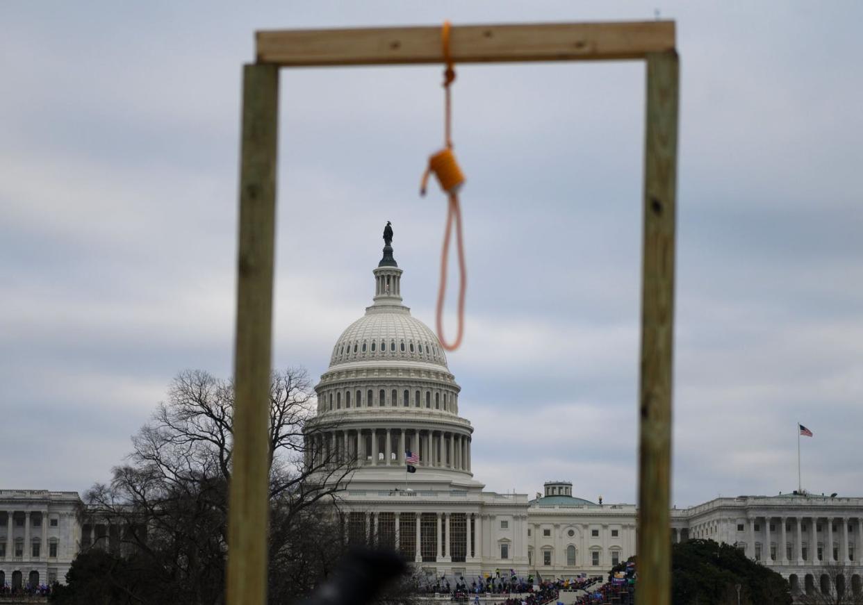 <span class="caption">The Jan. 6 insurrection at the U.S. Capitol offers an example of how refusing to accept election results can lead to violence. </span> <span class="attribution"><a class="link " href="https://www.gettyimages.com/detail/news-photo/noose-is-seen-on-makeshift-gallows-as-supporters-of-us-news-photo/1230473117" rel="nofollow noopener" target="_blank" data-ylk="slk:Andrew Caballero-Reynolds/AFP via Getty Images;elm:context_link;itc:0;sec:content-canvas">Andrew Caballero-Reynolds/AFP via Getty Images</a></span>