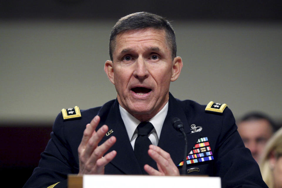 FILE - In this Feb. 11, 2014, file photo, then-Defense Intelligence Agency Director Lt. Gen. Michael Flynn testifies on Capitol Hill in Washington. Flynn resigned as President Donald Trump's national security adviser Monday, Feb. 13, 2017. (AP Photo/Lauren Victoria Burke, File)