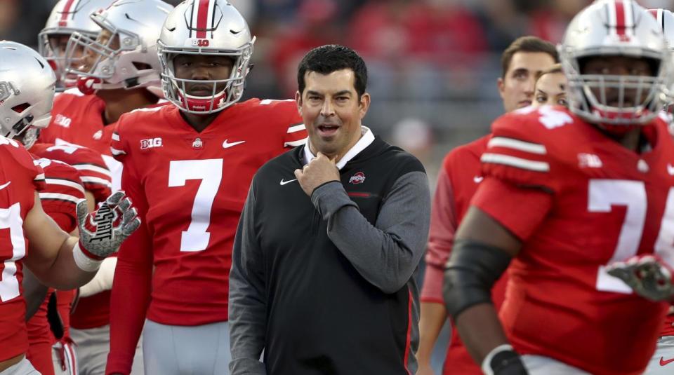 Ryan Day (middle) will try to keep Ohio State undefeated while Urban Meyer serves his suspension. (AP)