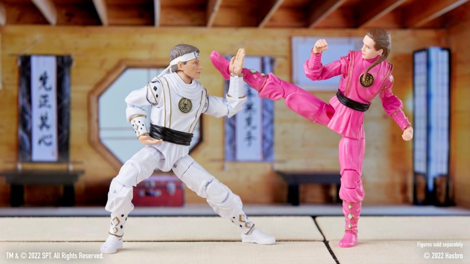 White and pink action figures fight from Cobra Kai and Mighty Morphin Power Rangers mashup