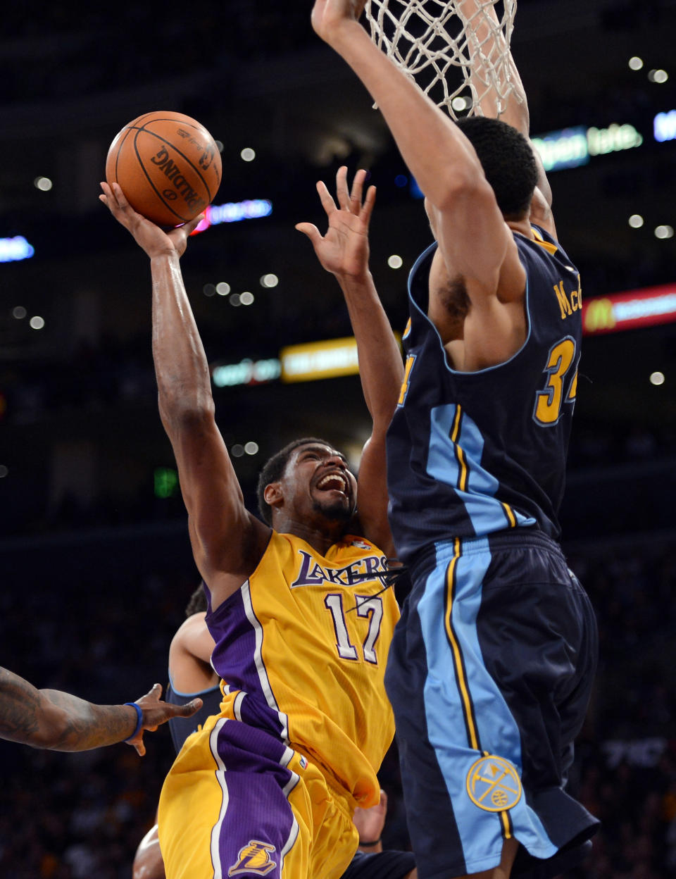 LOS ANGELES, CA - MAY 12: Andrew Bynum #17 of the Los Angeles Lakers goes up for a shot over JaVale McGee #34 of the Denver Nuggets in the first half in Game Seven of the Western Conference Quarterfinals in the 2012 NBA Playoffs on May 12, 2012 at Staples Center in Los Angeles, California. NOTE TO USER: User expressly acknowledges and agrees that, by downloading and or using this photograph, User is consenting to the terms and conditions of the Getty Images License Agreement. (Photo by Harry How/Getty Images)