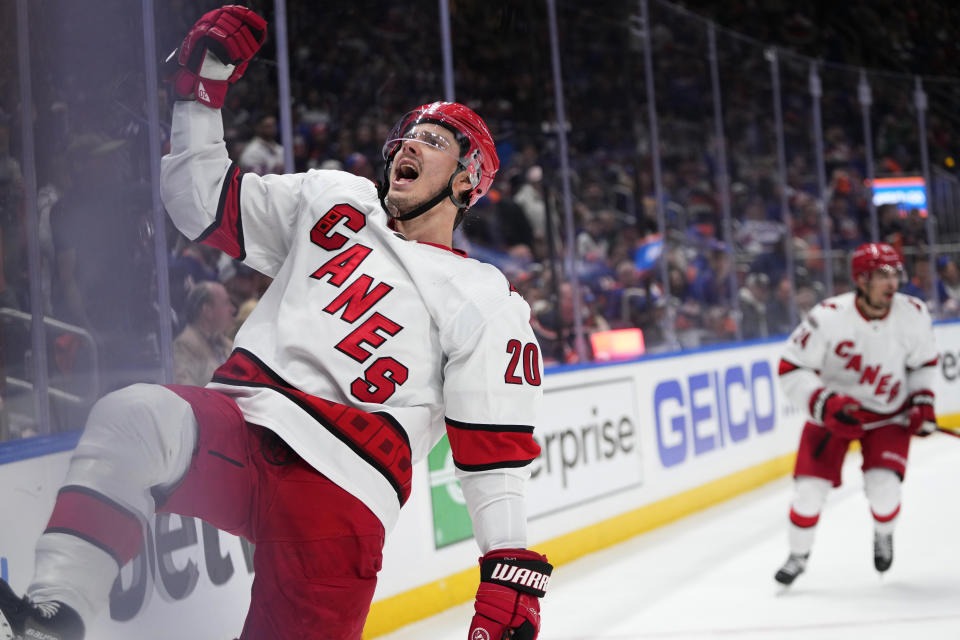 Carolina Hurricanes' Sebastian Aho (20) celebrates after scoring a goal during the third period of Game 6 of the team's NHL hockey Stanley Cup first-round playoff series against the New York Islanders on Friday, April 28, 2023, in Elmont, N.Y. (AP Photo/Frank Franklin II)