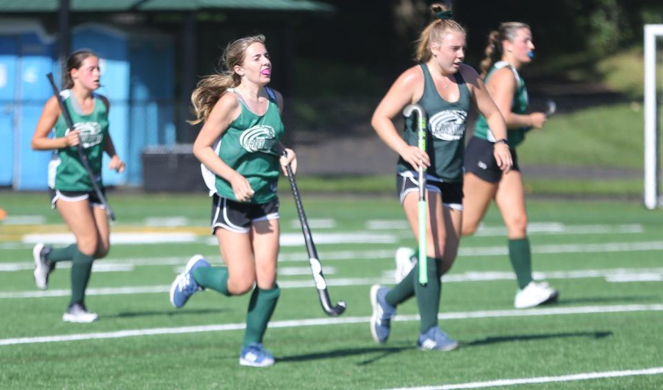 A few members of the 2023 Dover High School field hockey team during a preseason scrimmage against Portsmouth in Portsmouth.