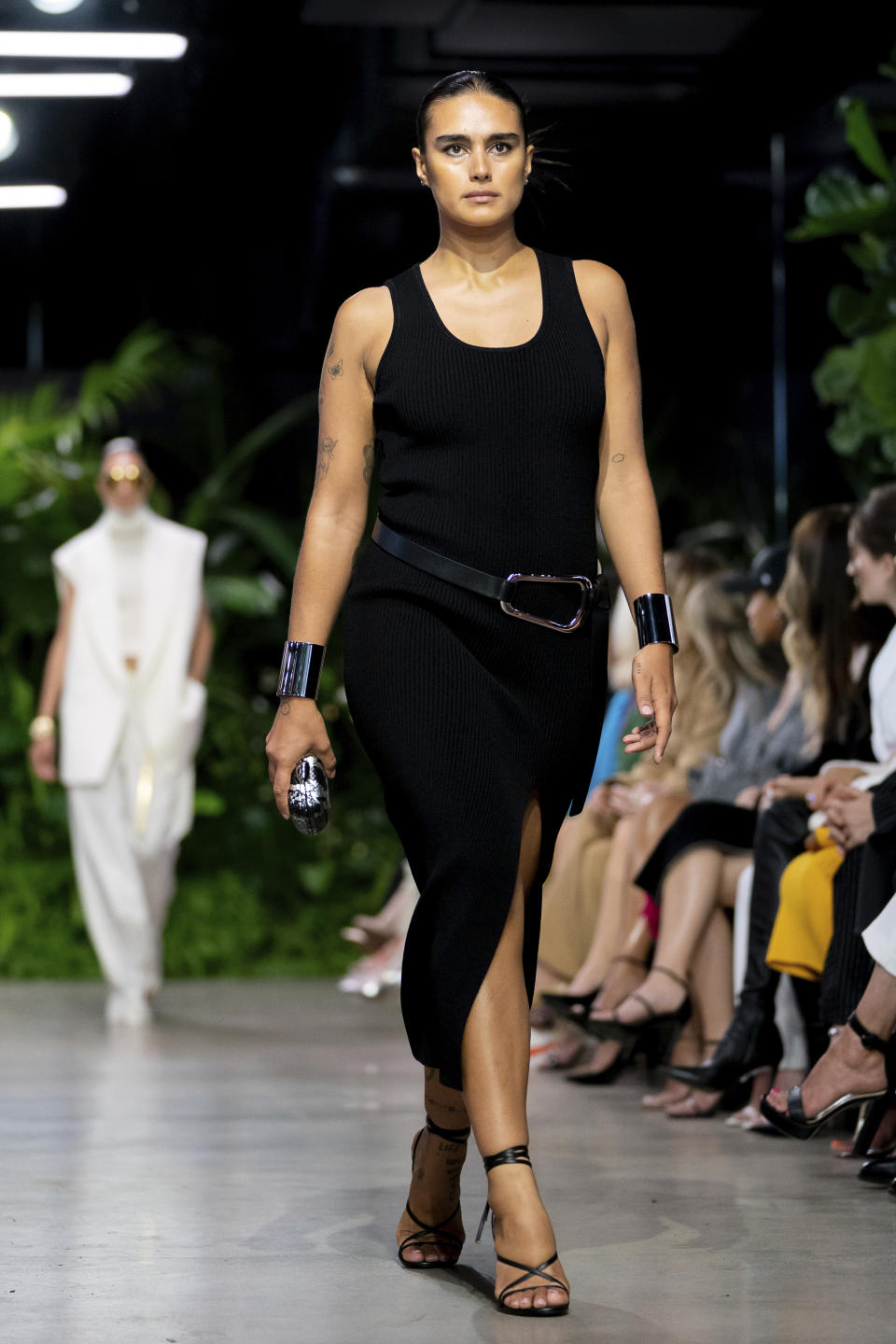 The Michael Kors collection is modeled during Fashion Week, Wednesday, Sept. 14, 2022, in New York. (AP Photo/Julia Nikhinson)