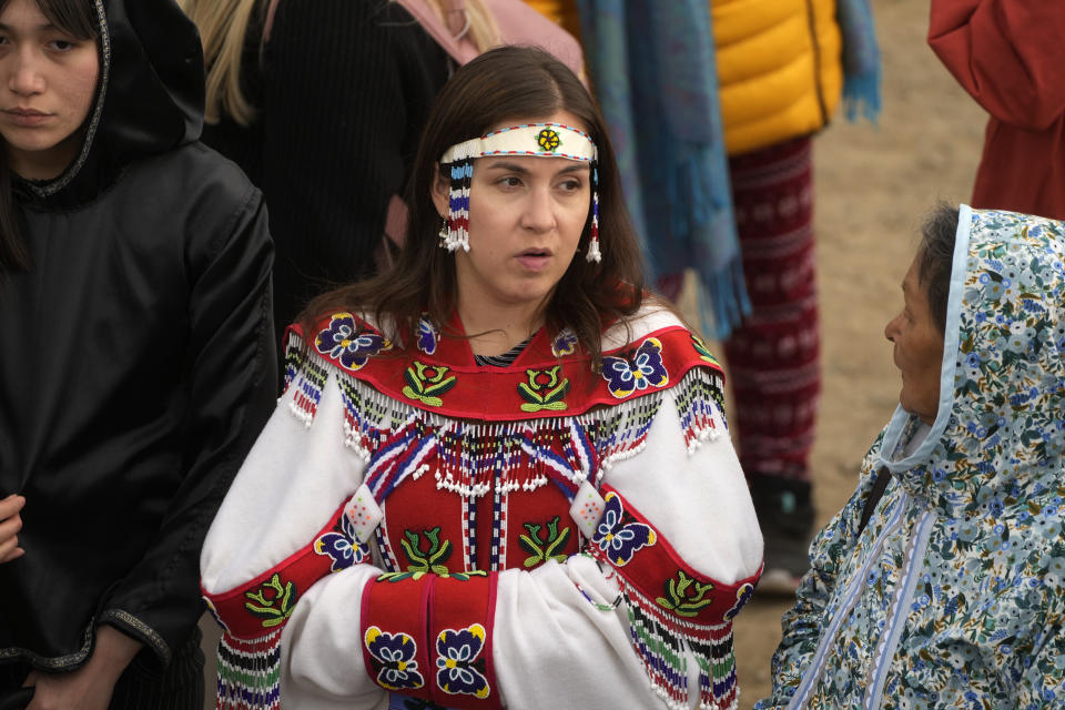 Young and elders people wait a meeting with Pope Francis at Nakasuk Elementary School Square in Iqaluit, Canada, Friday, July 29, 2022. Pope Francis travels to chilly Iqaluit, capital of northern Nunavut, to meet with Inuit Indigenous people, including school children and survivors of residential schools, in his final day in Canada. (AP Photo/Gregorio Borgia)