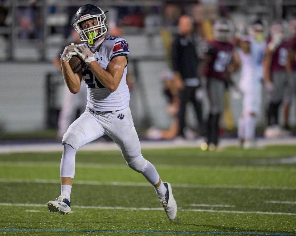 Trinity's Webber McClinton (28) hauls in a long pass for a touchdown against Alabama Christian Academy during their game on the Faulkner University campus in Montgomery, Ala., on Friday September 15, 2023.