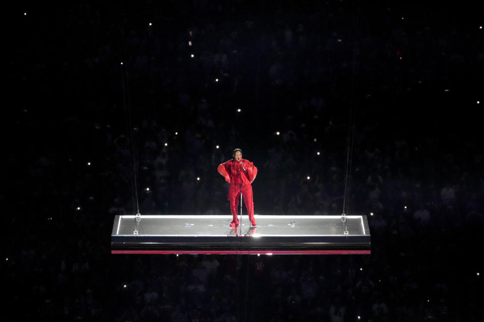 Rihanna performs at halftime during the NFL Super Bowl 57 football game between the Kansas City Chiefs and the Philadelphia Eagles, Sunday, Feb. 12, 2023, in Glendale, Ariz. (AP Photo/Charlie Riedel)