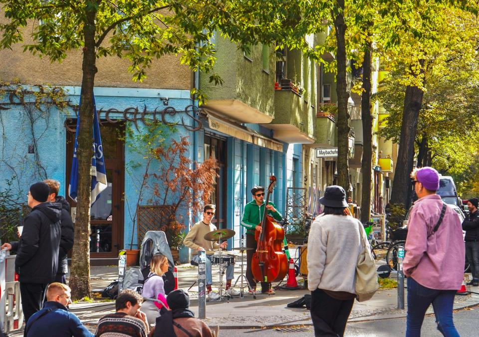 Musicians play on a street corner in Kreuzberg.