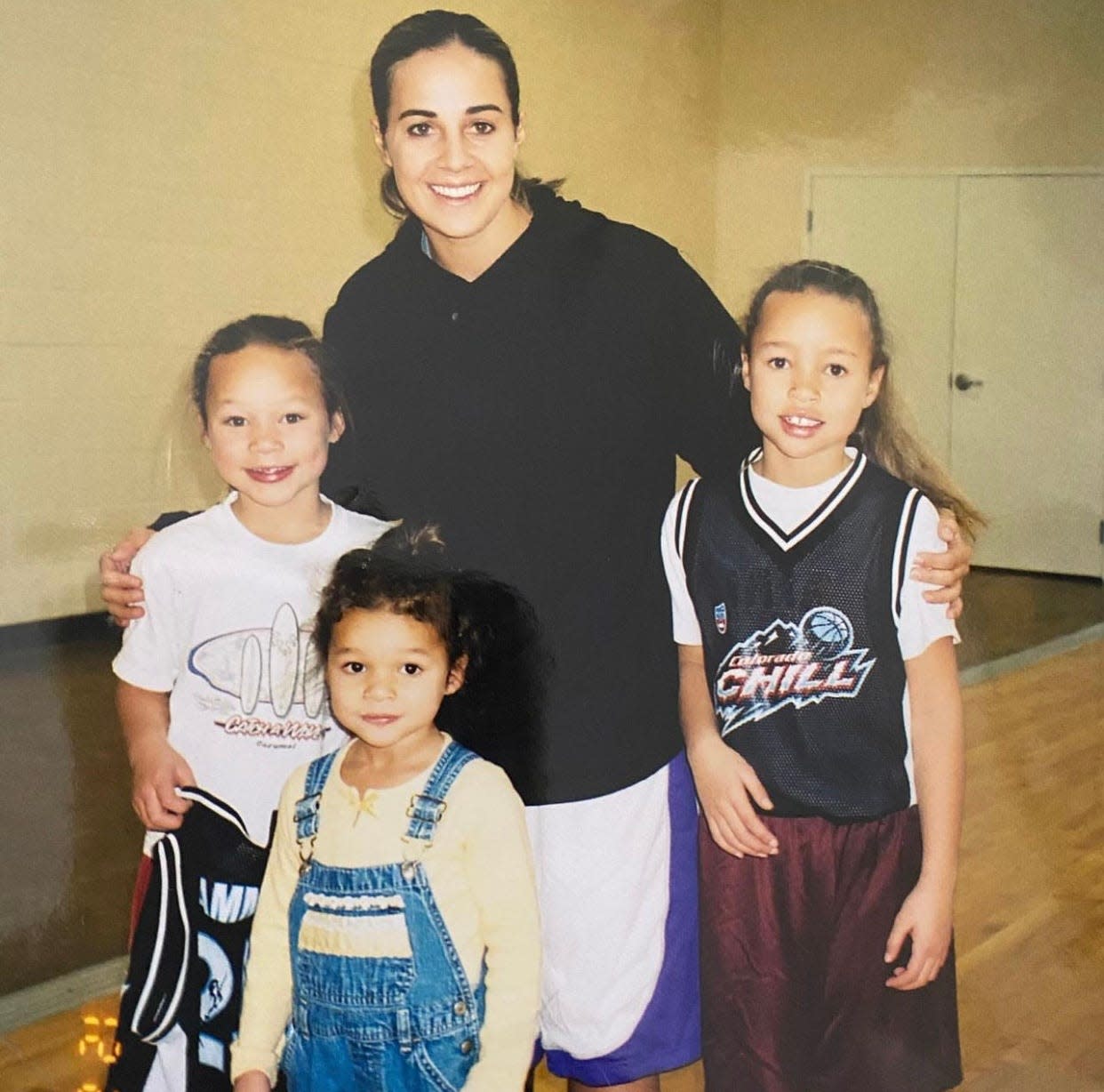 As girls Sophia Smith (center) and her sisters Savannah (left) and Gabby (right) were regulars at former Colorado State star and current WNBA coach Becky Hammon's games.