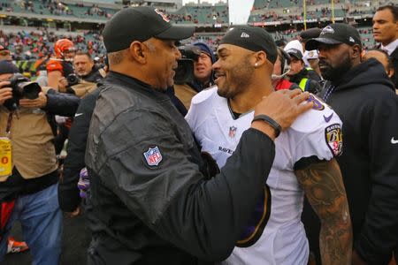 Jan 1, 2017; Cincinnati, OH, USA; Cincinnati Bengals head coach Marvin Lewis (left) hugs Baltimore Ravens wide receiver Steve Smith (right) after their game at Paul Brown Stadium. Mandatory Credit: Aaron Doster-USA TODAY Sports