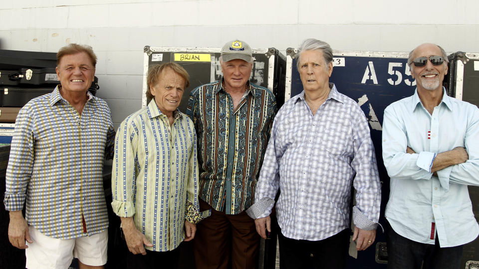 In this April 18, 2012 photo, The Beach Boys, from left, Bruce Johnston, Al Jardine, Mike Love, Brian Wilson and David Marks pose for a portrait in Burbank, Calif. After decades of prolonged separations, legal spats and near reunions, the core Beach Boys are back together, both on stage and for an upcoming new album. (AP Photo/Matt Sayles)