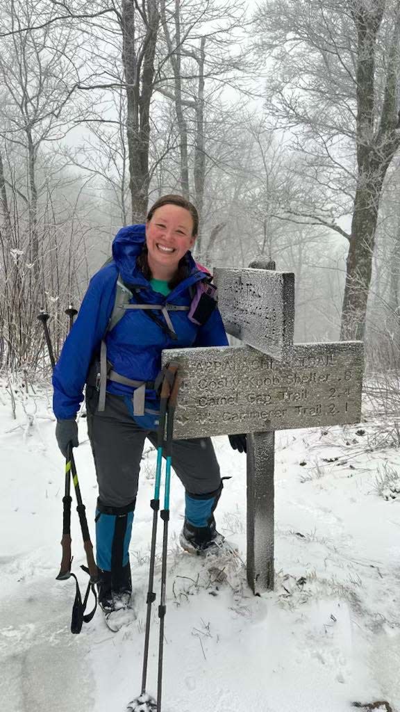 A bit of snow doesn’t stop Ashley Walker from hiking the Great Smoky Mountains National Park at the intersection of Low Gap Trail and the Appalachian Trail Feb 17, 2024.