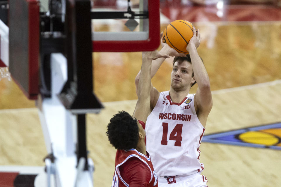 Wisconsin forward Carter Gilmore (14) shoots against Bradley during the first half of an NCAA college basketball game in the first round of the NIT in Madison, Wis., Tuesday, March 14, 2023. (Samantha Madar/Wisconsin State Journal via AP)