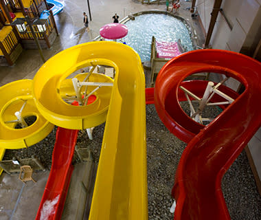 A nine-foot-tall cascade feeds the 1,000-square-foot Basketball Cove (two hoops for water basketball) while Big Bear Falls features a 500-gallon “deluge bucket” shooting water out in a big circle. The biggest cascade is the 30-foot-wide, 13-foot-tall waterfall pouring into the Whitewater Wave Pool. For tiny tykes, Little Bear Falls emits tickling bursts of water and air bubbles. cascadesindoorwaterpark.com